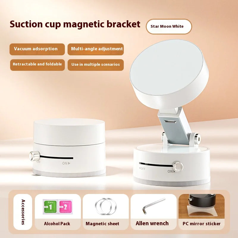 A black foldable magnetic vacuum car phone holder with an adjustable mount on a dashboard.