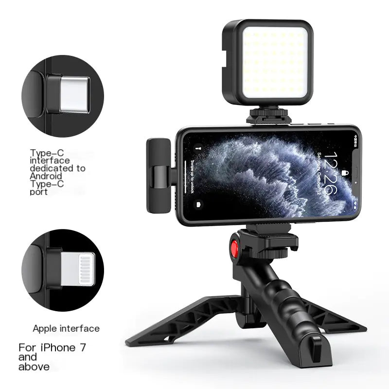Phone holder with light and tripod on a white background