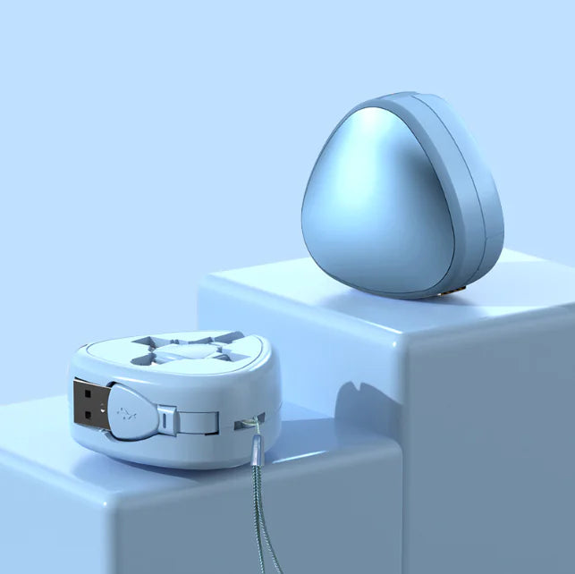 White electronic device with a cable on a light blue background