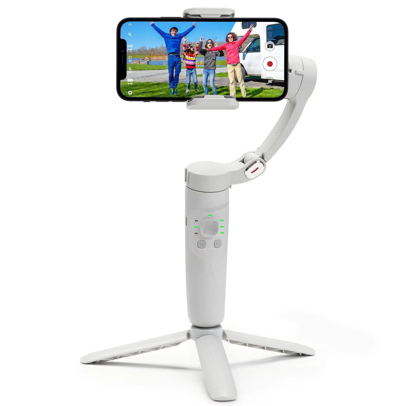 White smartphone gimbal with phone displaying a video of people on a grassy area.