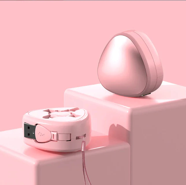 Pink electronic device on a pink background